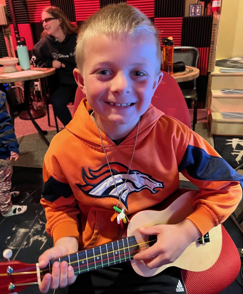Kaydon with his shiny new ukulele!!